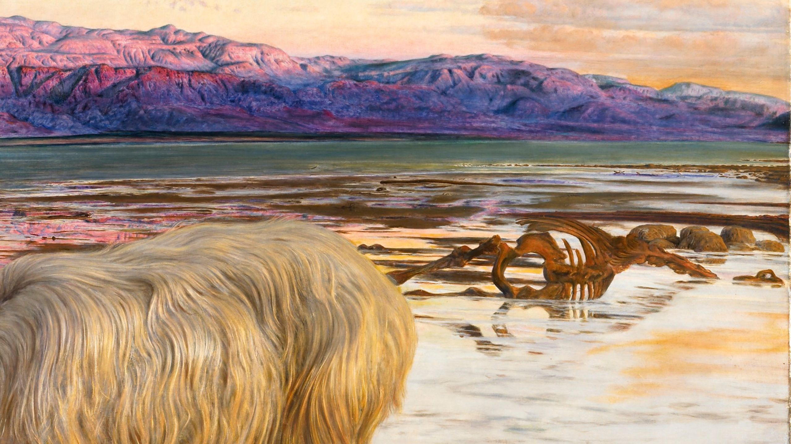 desolate landscape with a vivid green sea and purple mountains in the background